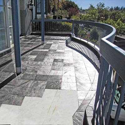 Elevated Tile Deck with Cut-out Showing Tiledek Membrane